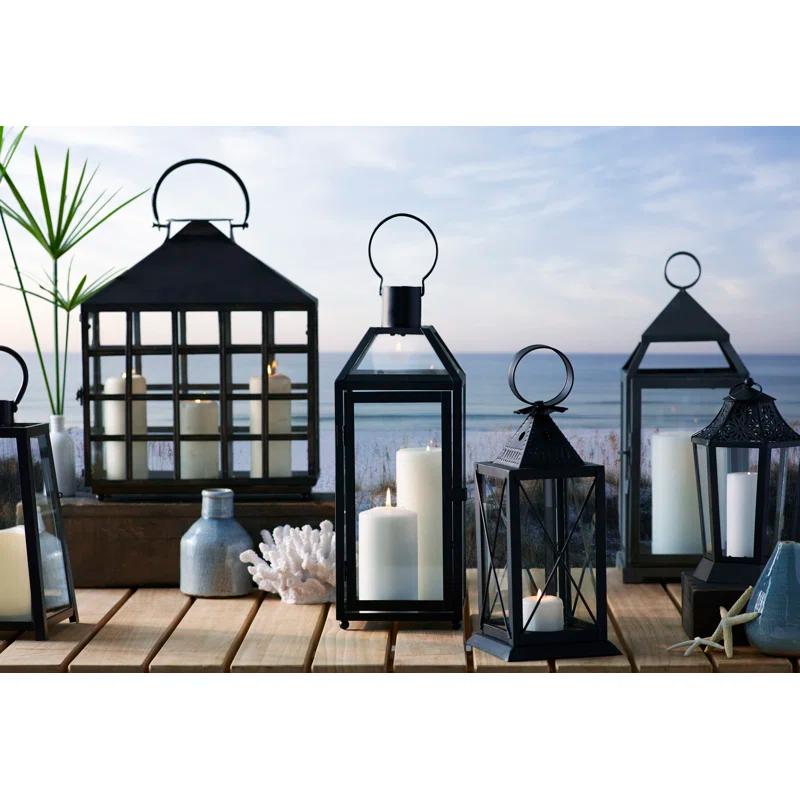 The Holiday Aisle® Black Tapered Metal Lantern with Battery Operated Candle
