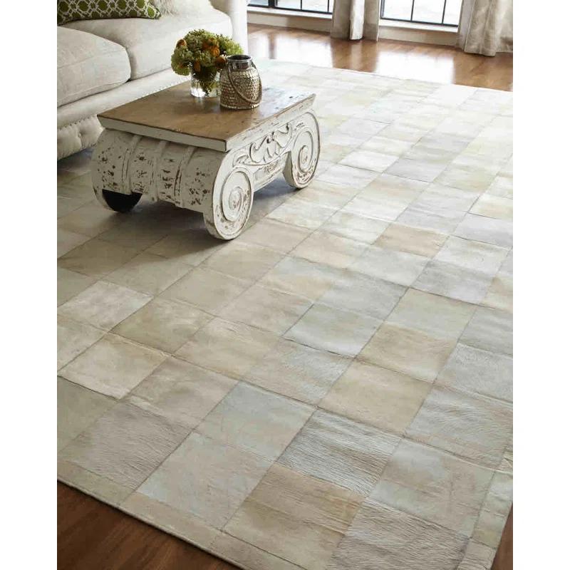 Exquisite Rugs Natural Hide Hand Stitched Leather Hide on Felt White Area Rug & Reviews | Wayfair