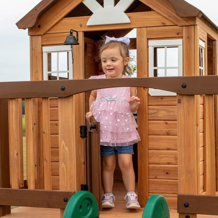 Backyard Discovery Echo Heights Cedar Wooden Elevated Kids Playhouse with Wave Slide, Play Kitchen, and Deck & Reviews | Wayfair