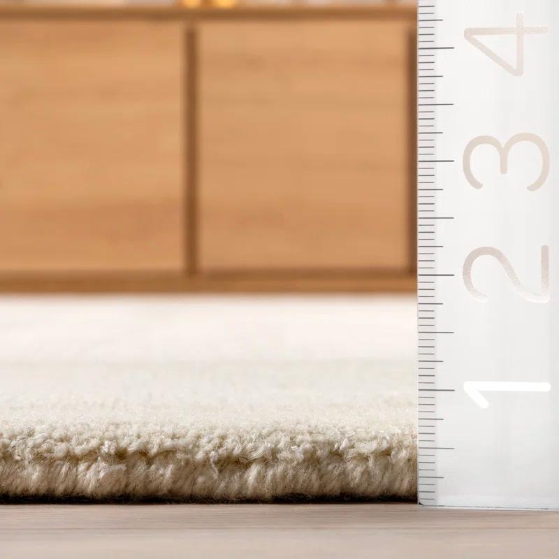 Latitude Run® Rune Bordered Wool-Blend Area Rug