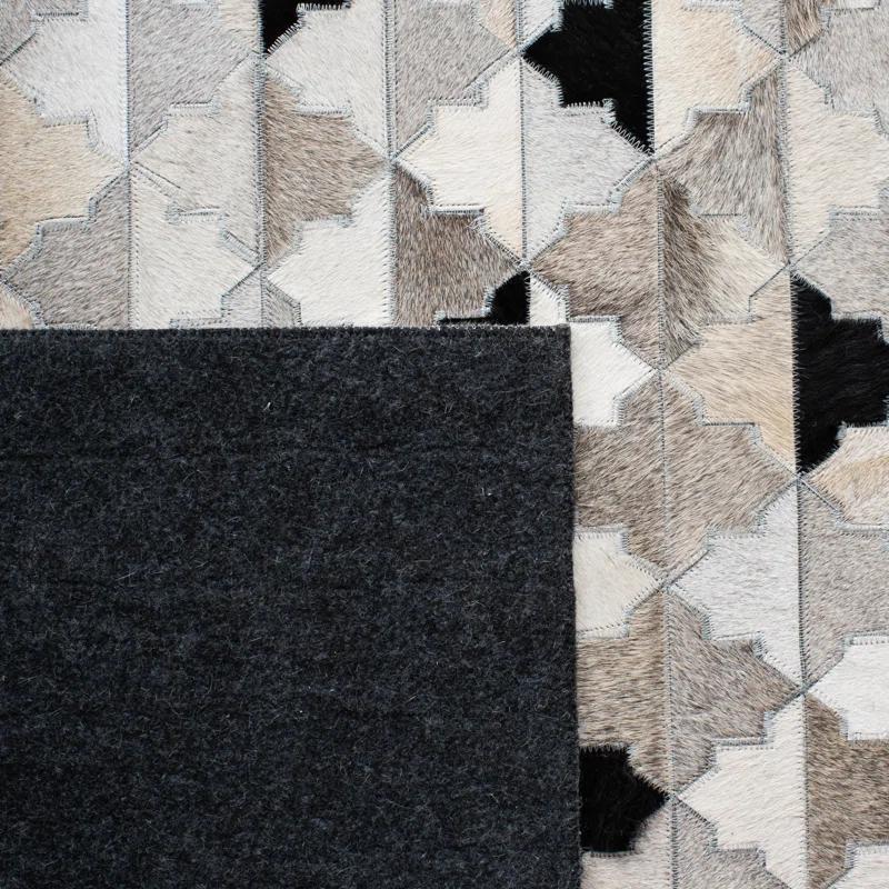 Loon Peak® Brentnal Flat Weave Hair On Leather Geometric Rug