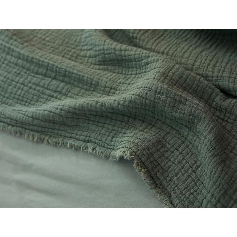 Coyuchi Topanga Matelasse Plain Weave / Muslin Throw Blanket
