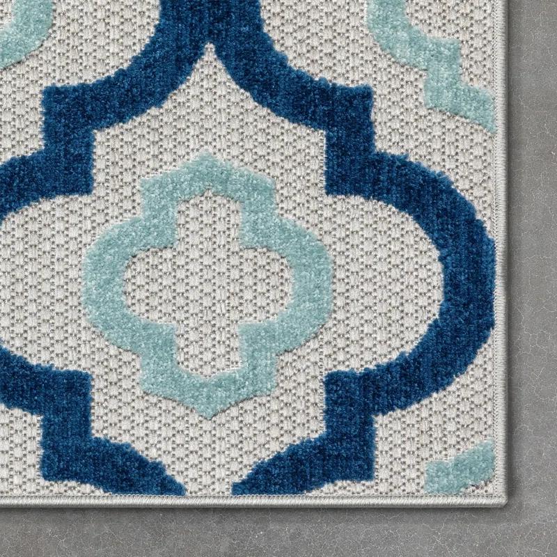 Ebern Designs Dickenson Illuminate Geometric Blue Indoor/Outdoor Hi-Lo Area Rug