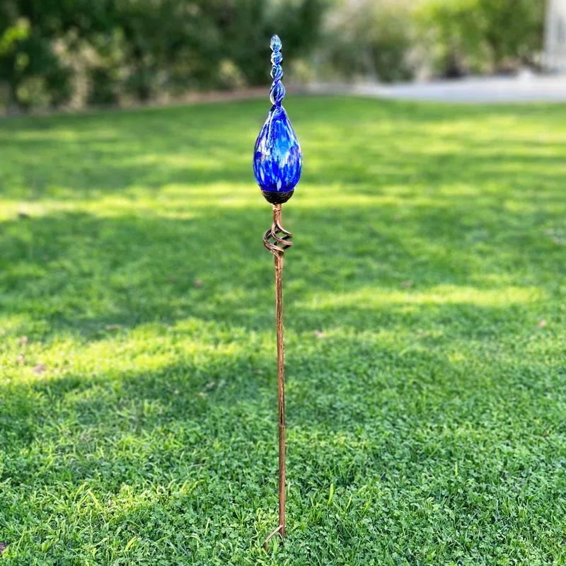 Exhart Exhart Solar Pearlized Hand Blown Glass Twisted Flame Garden Stake with Metal Finial Detail, 36 Inch