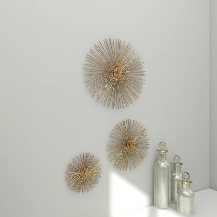 CosmoLiving by Cosmopolitan Gold Metal Starburst 3D Short Spike Home Wall Decor, Set of 3 6", 9", 12"W