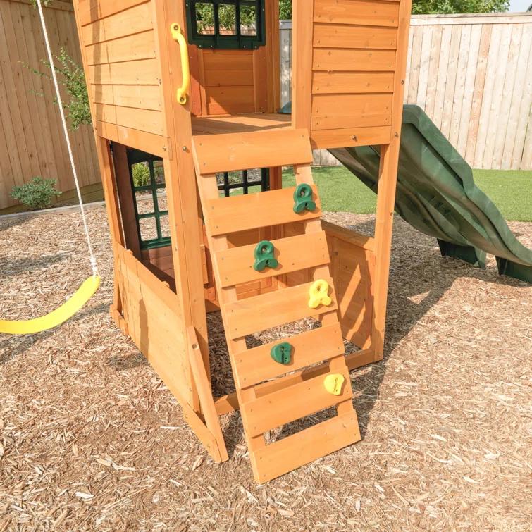 KidKraft Treasure Cove Wooden Swing Set with Slides and Rock Wall