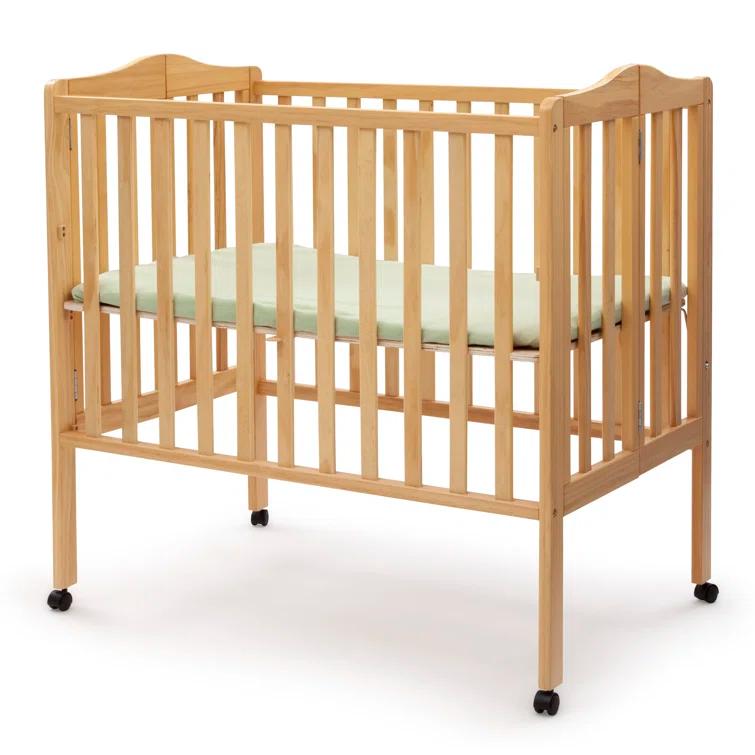 Delta Children Folding Mini Portable Crib with Mattress