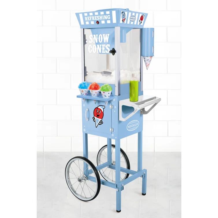 Nostalgia Nostalgia 54-Inch Tall Snow Cone Cart, Makes 72 Icy Treats, Includes Metal Scoop, 2 Syrup Bottles, 100 Paper Cups/Spoons, Storage Compartment, Wheels For Easy Mobility