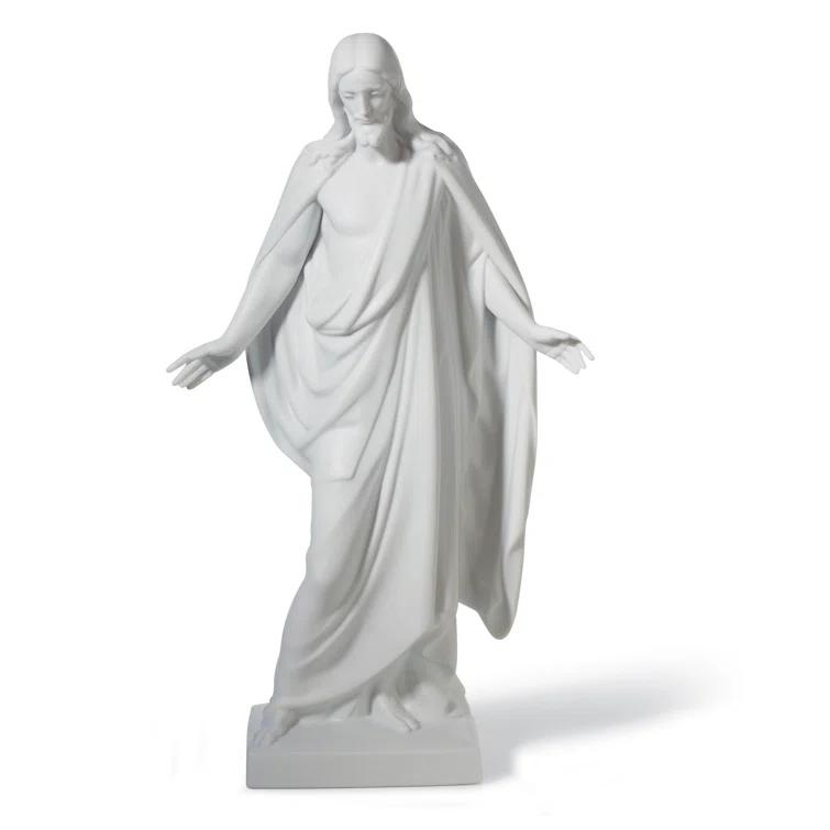 Lladro Christ Figurine. Left