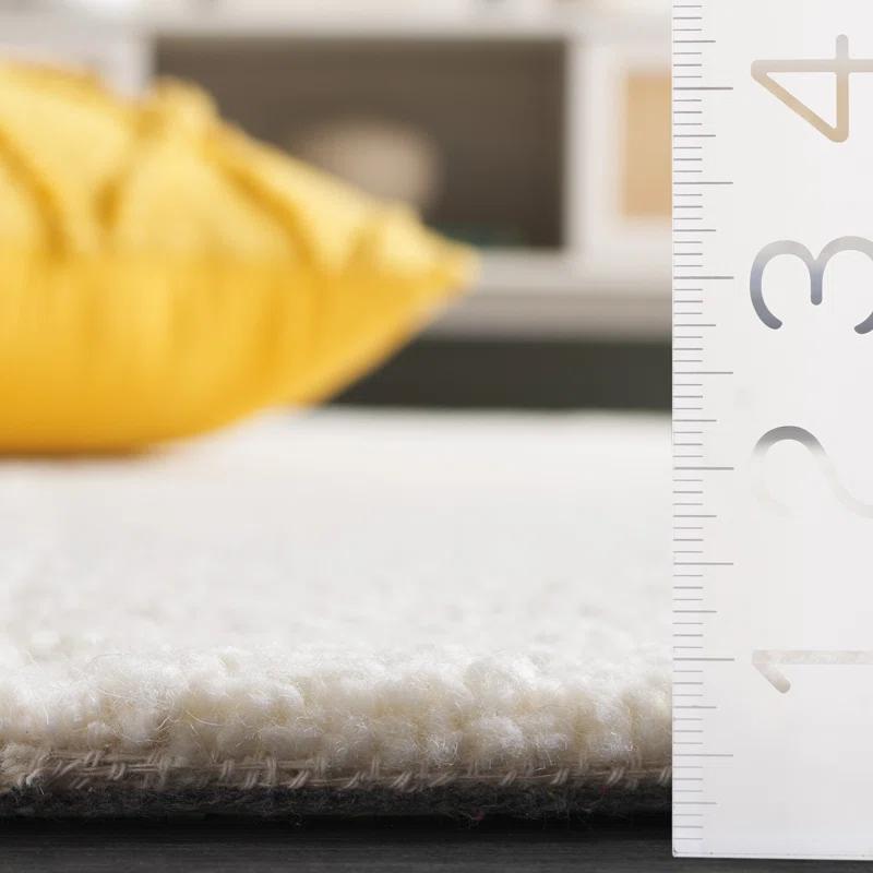 Safavieh Casablanca 470 Hand Tufted Wool Pile Solid Color Rug