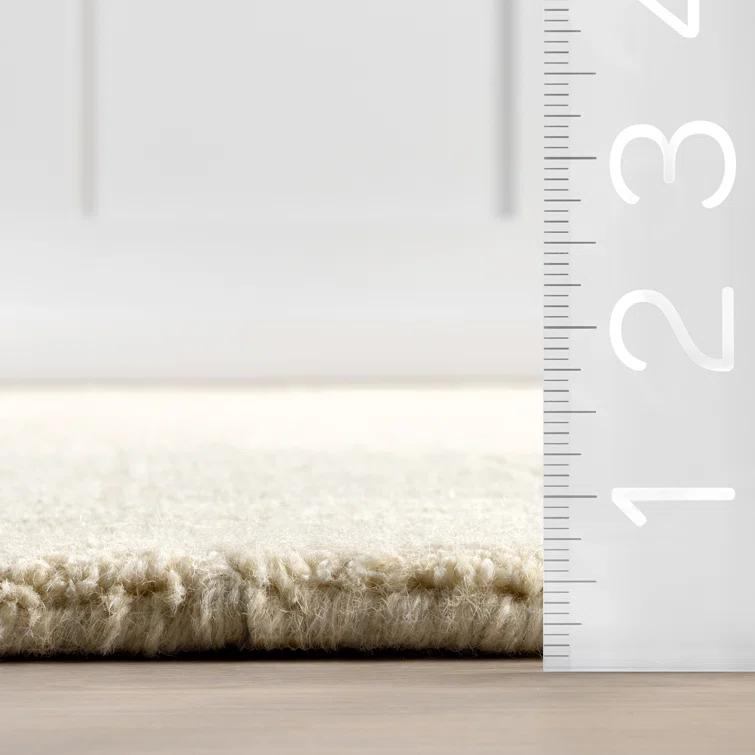 Latitude Run® Rune Bordered Wool-Blend Area Rug