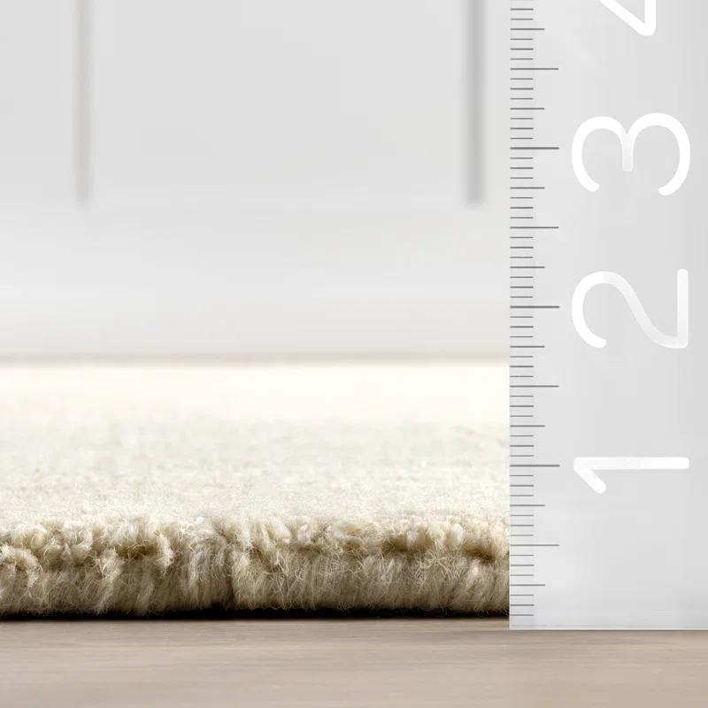 Latitude Run® Rune Bordered Wool-Blend Area Rug