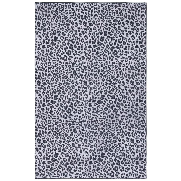 Everly Quinn Faux Hide Performance Machine Washable Animal Print Rug
