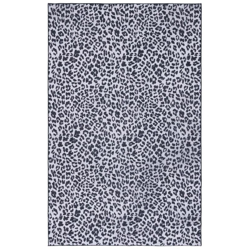 Everly Quinn Faux Hide Performance Machine Washable Animal Print Rug