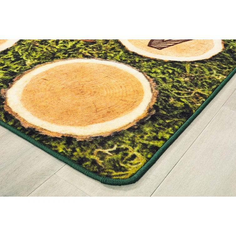 Carpets for Kids Pixel Perfect™ Alphabet Wood Stumps in Grass Tufted Brown/Green Area Rug