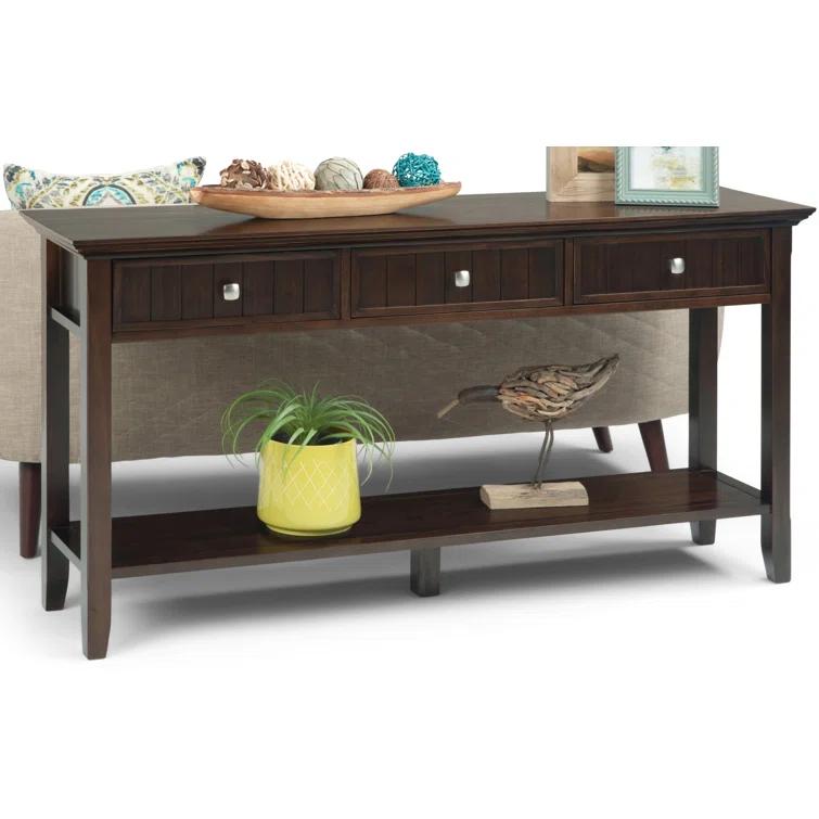 Simpli Home Acadian 60"W Solid Wood Wide Storage Console Table in Brunette Brown with Three Drawers and Open Shelf