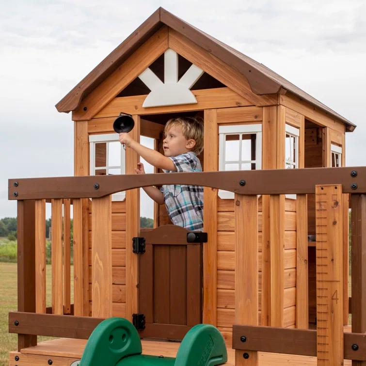 Backyard Discovery Echo Heights Cedar Wooden Elevated Kids Playhouse with Wave Slide, Play Kitchen, and Deck & Reviews | Wayfair