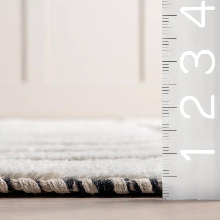 Ebern Designs Merrick Tasseled Cotton and Wool Area Rug