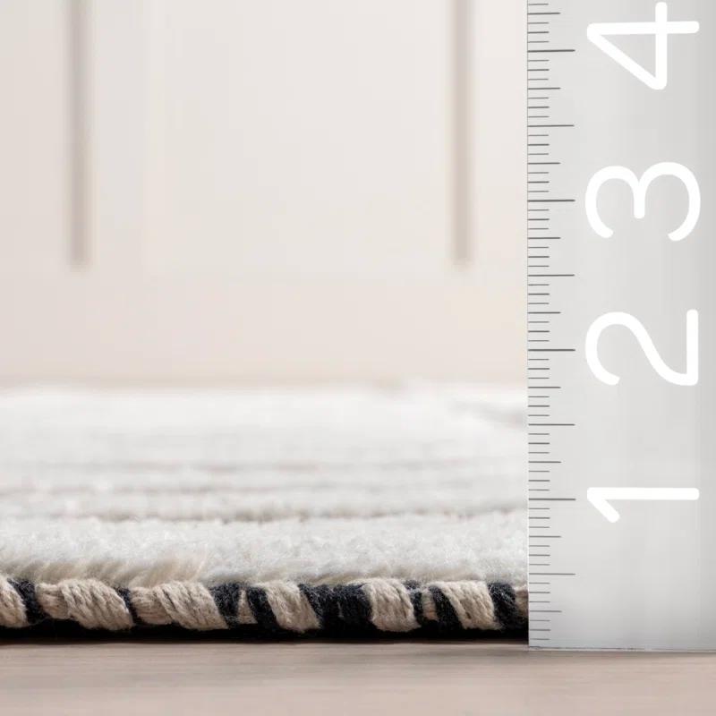 Ebern Designs Merrick Tasseled Cotton and Wool Area Rug