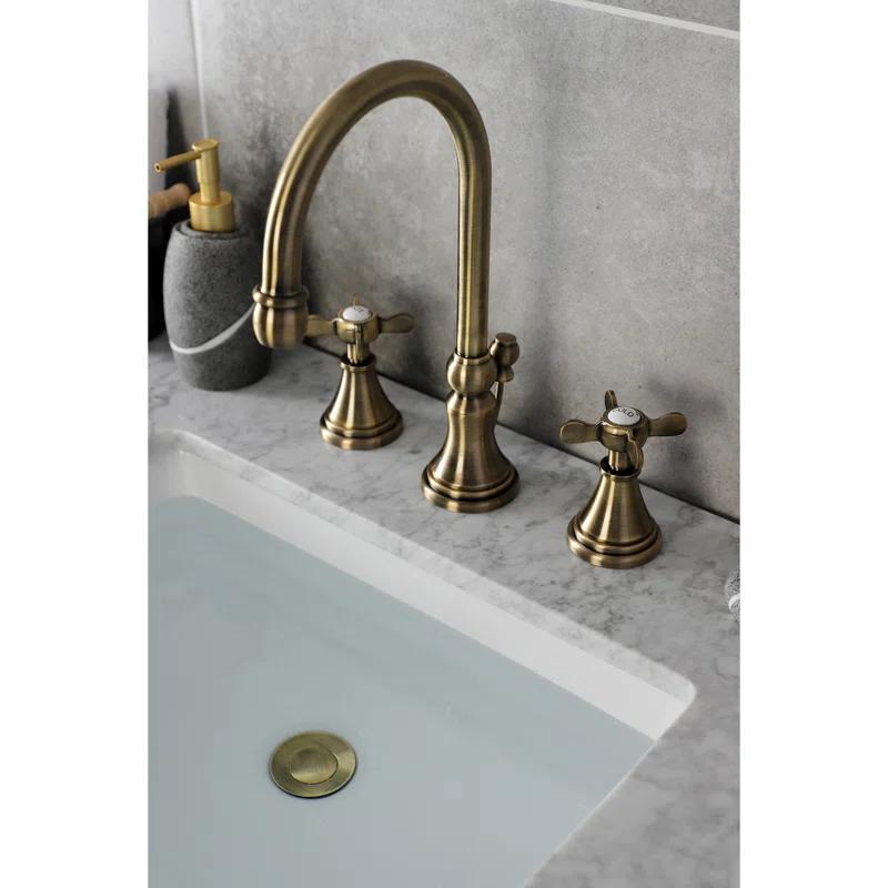 Kingston Brass Essex Two-Handle 3-Hole Deck Mount Widespread Bathroom Faucet with Brass Pop-Up Drain