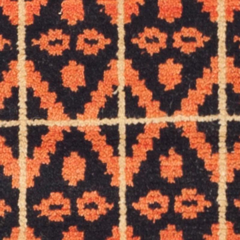 Union Rustic Alimatou Hand Knotted Wool/Cotton Southwestern Rug in Orange/Black