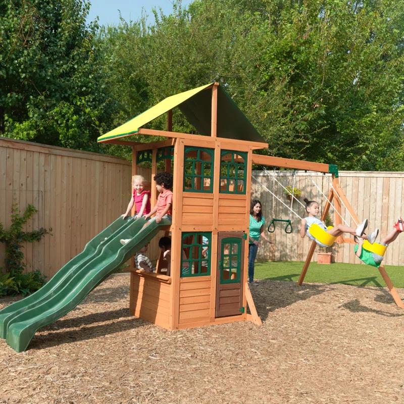 KidKraft Treasure Cove Wooden Swing Set with Slides and Rock Wall