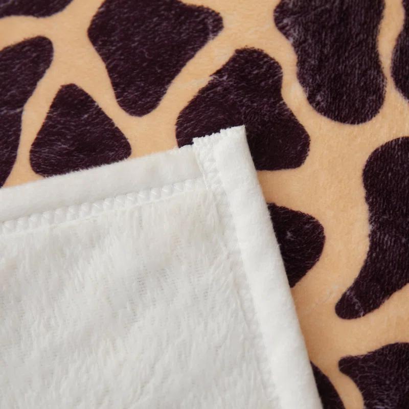 Kindred Home Lightweight Flannel Fleece Leopard Print Throw Blanket for Couch, Bed, Holiday Decor (60x80 Inches)