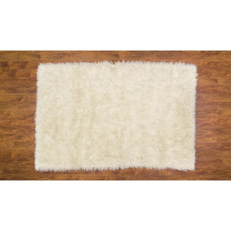Ebern Designs Aaiden Flokati Wool Shag Hand Loomed Ivory Rug