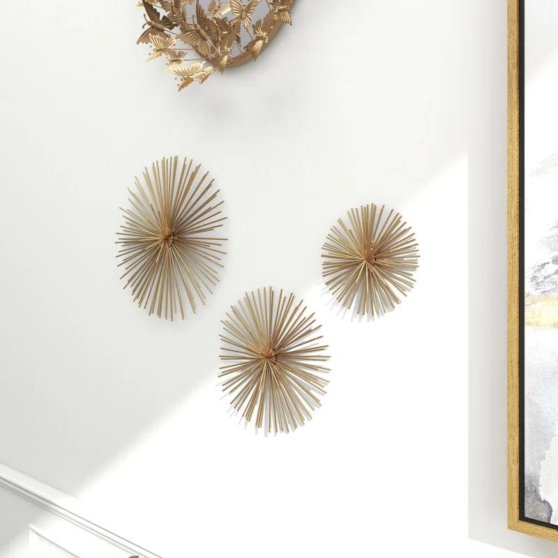 CosmoLiving by Cosmopolitan Gold Metal Starburst 3D Short Spike Home Wall Decor, Set of 3 6", 9", 12"W