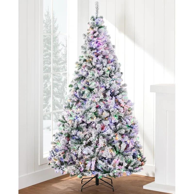 The Holiday Aisle® The Pre-Lit Artificial Christmas Tree Snow Flocked Pine Tree, Multicolor LED Lights
