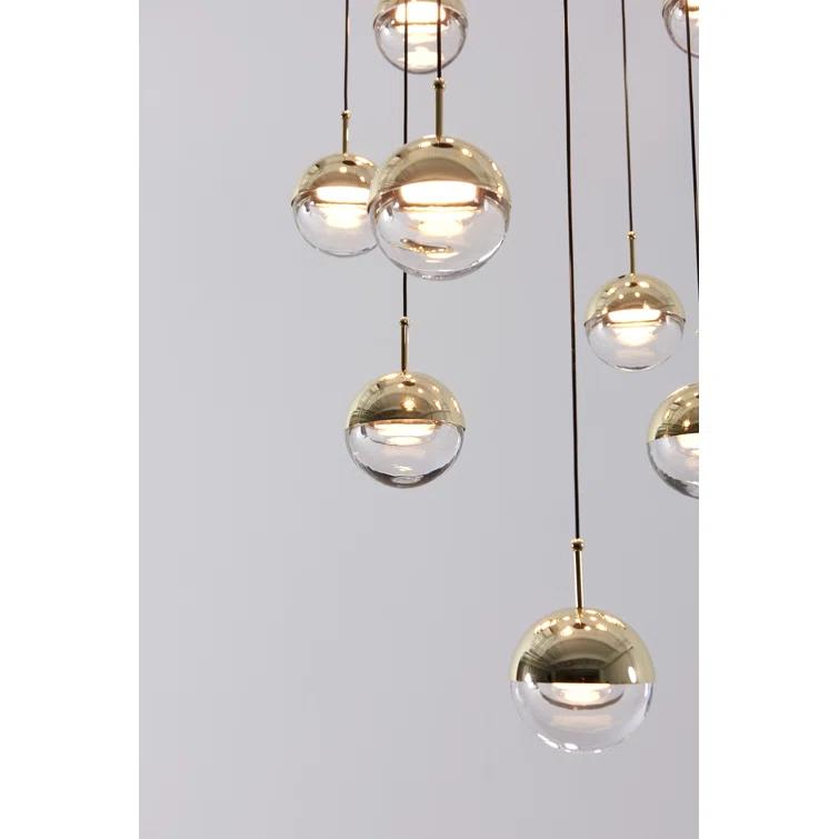 Dora Brass Globe 12-Light LED Pendant with Warm Orb Effect