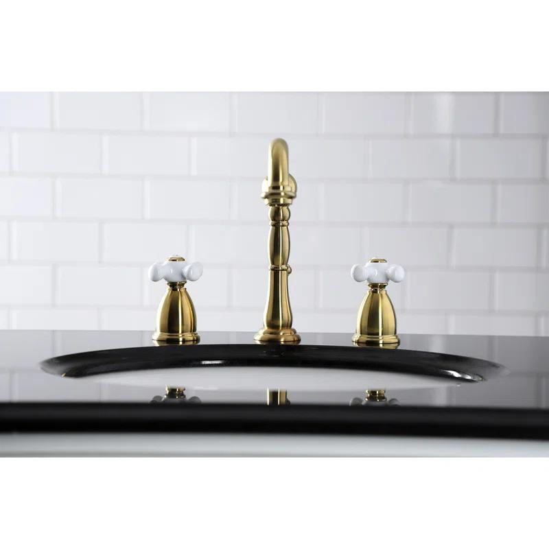 Kingston Brass KB1977PX Kingston Brass Heritage Two-Handle 3-Hole Deck Mount Widespread Bathroom Faucet with Brass Pop-Up Drain