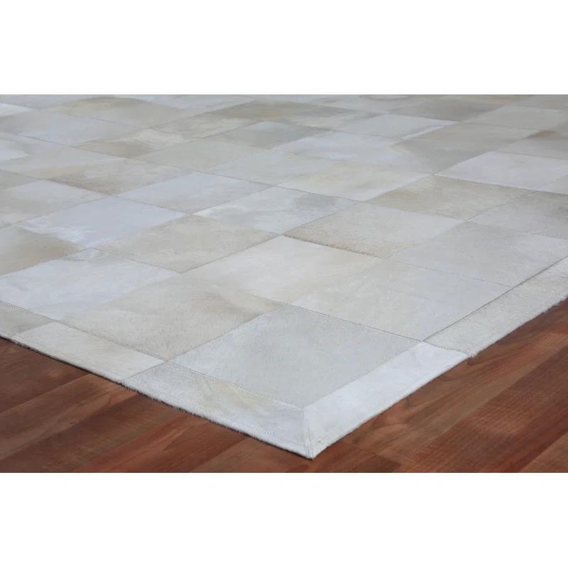 Exquisite Rugs Natural Hide Hand Stitched Leather Hide on Felt White Area Rug & Reviews | Wayfair