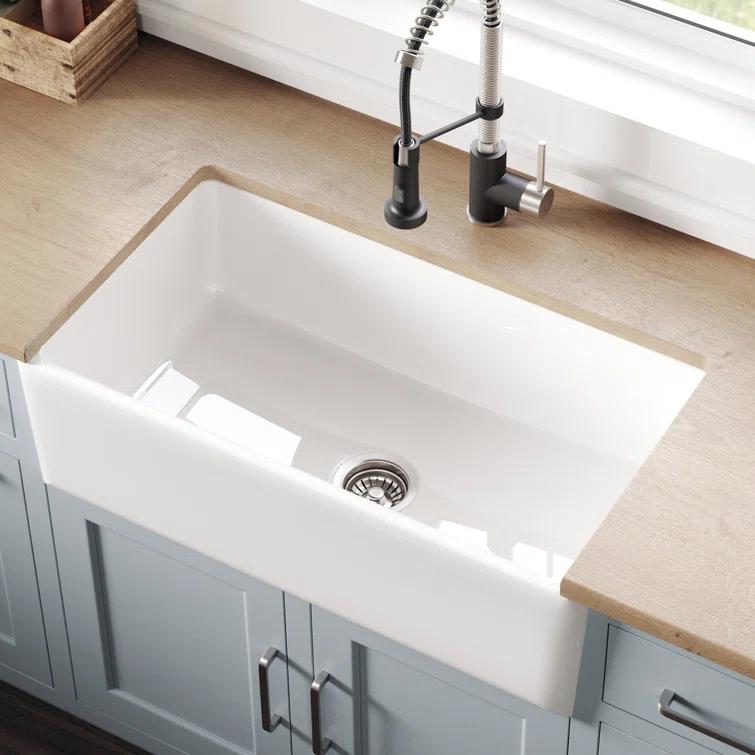 KRAUS Turino™ Reversible 33-inch L Fireclay Farmhouse Flat Apron Front Single Bowl Kitchen Sink with Bottom Grid