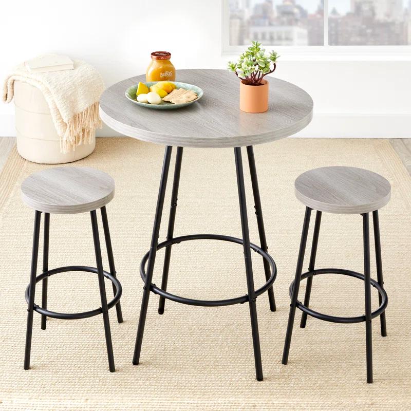 17 Stories Sevon 3-Piece Bistro Set, Modern Round Counter Height Dining Set w/ 2 Stools, Metal Frame