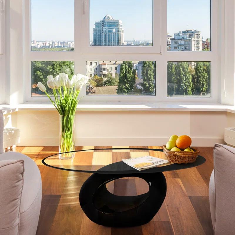 Orren Ellis Glass Top Coffee Table