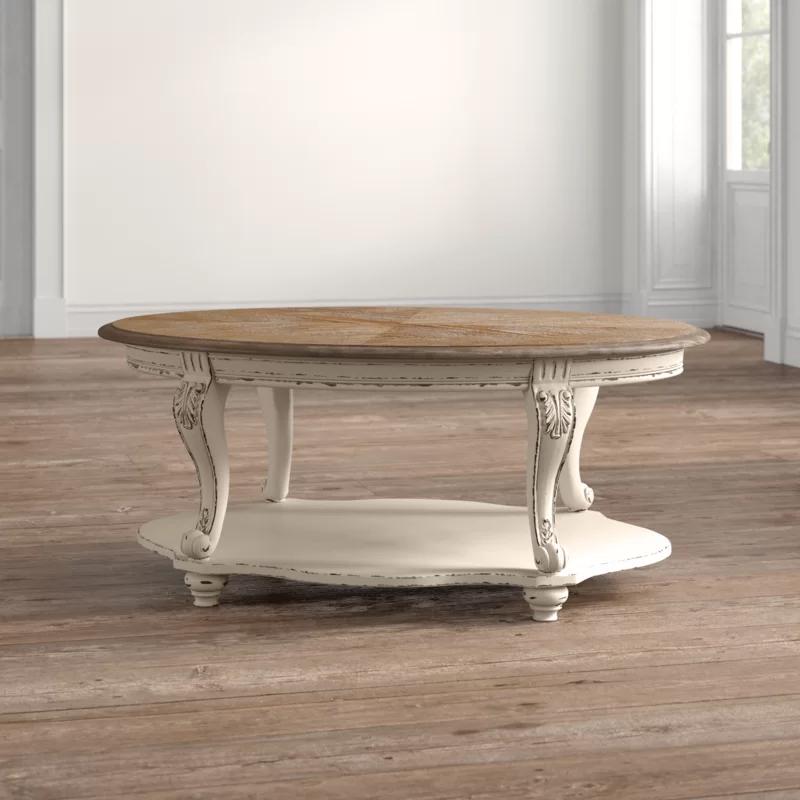 Antiqued Two-Tone Oval Wood Coffee Table with Cabriole Legs