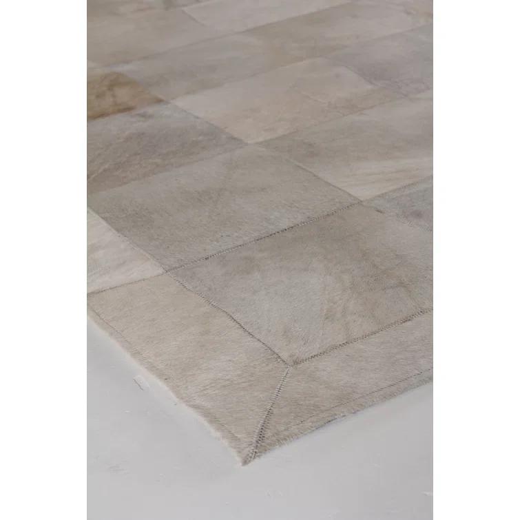 Exquisite Rugs Natural Hide Hand Stitched Leather Hide on Felt White Area Rug & Reviews | Wayfair