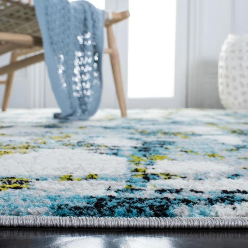 Trent Austin Design® Hollman Abstract Teal/Green/White Area Rug