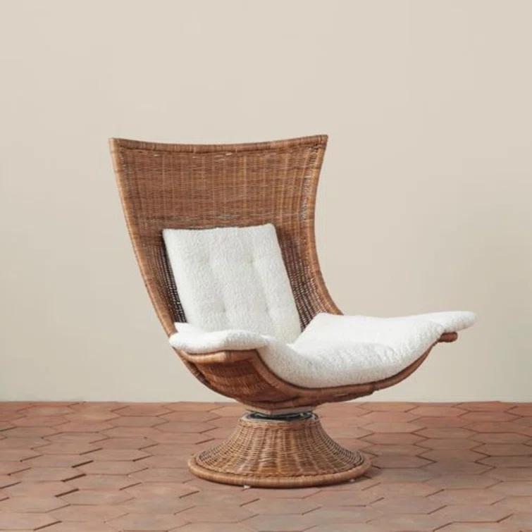 Woven Healdsburg Swivel Chair in Rattan | Perigold