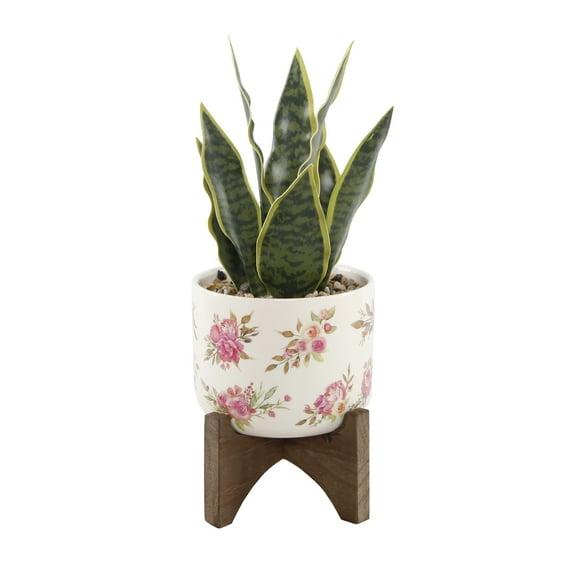 12" Artificial Snake Plant in Floral Print Ceramic Planter on Wood Stand
