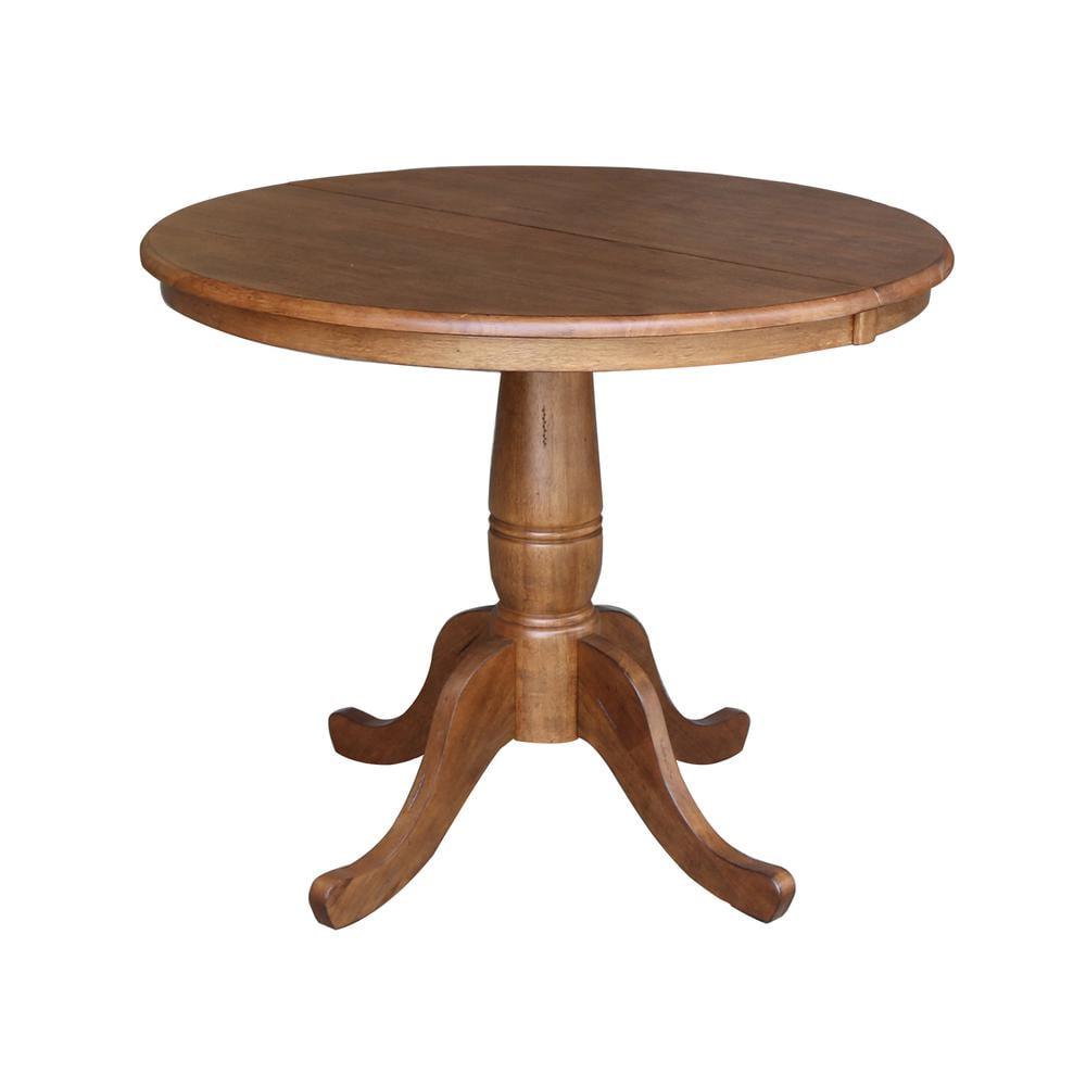 Keanan Round Top Pedestal Table with 12" Drop Leaf Distressed Oak - International Concepts