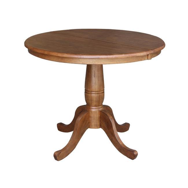 Keanan Round Top Pedestal Table with 12" Drop Leaf Distressed Oak - International Concepts