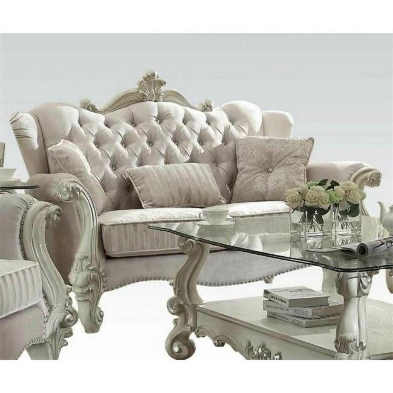 Ivory Tufted Leather Loveseat with Nailhead Trim and Round Arms