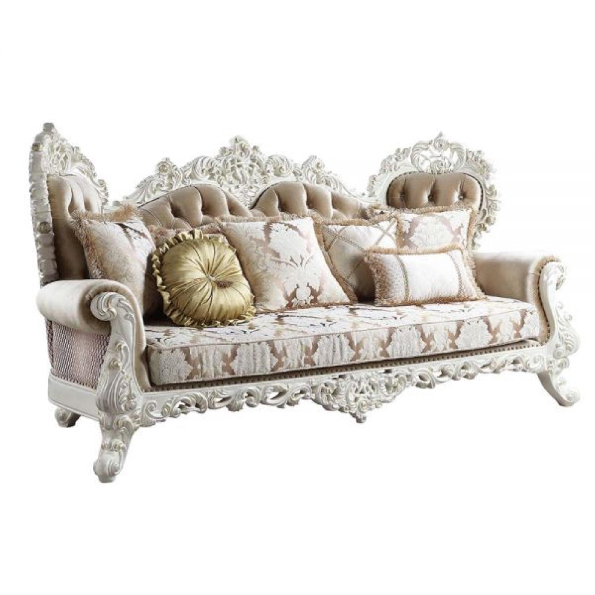 Antique White Tufted Sofa with Floral Cushions and Nailhead Trim