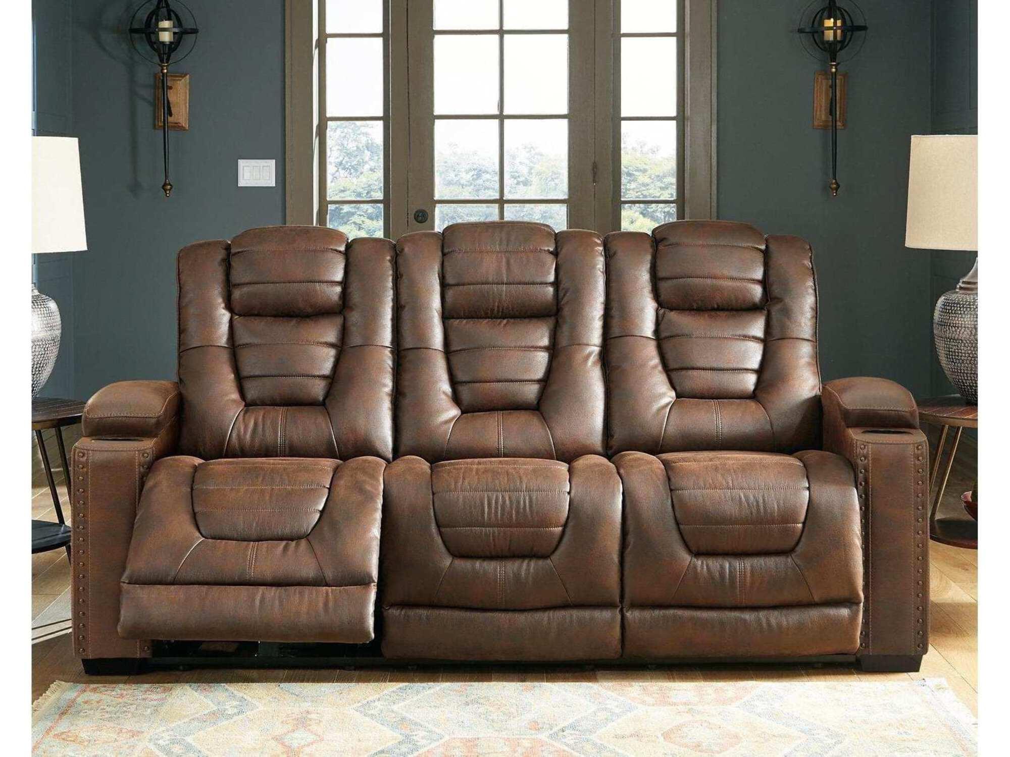 Brown Tufted Faux Leather Reclining Sofa with Storage and Cup Holder