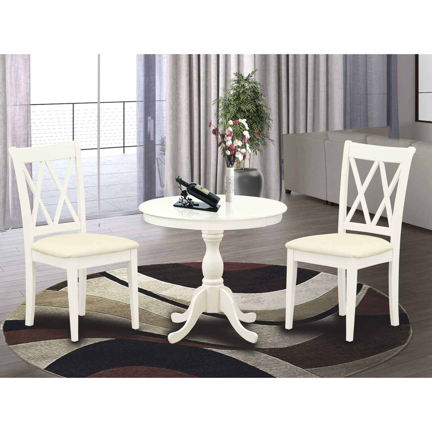 Linen White Round Pedestal Table with Double X-Back Chairs