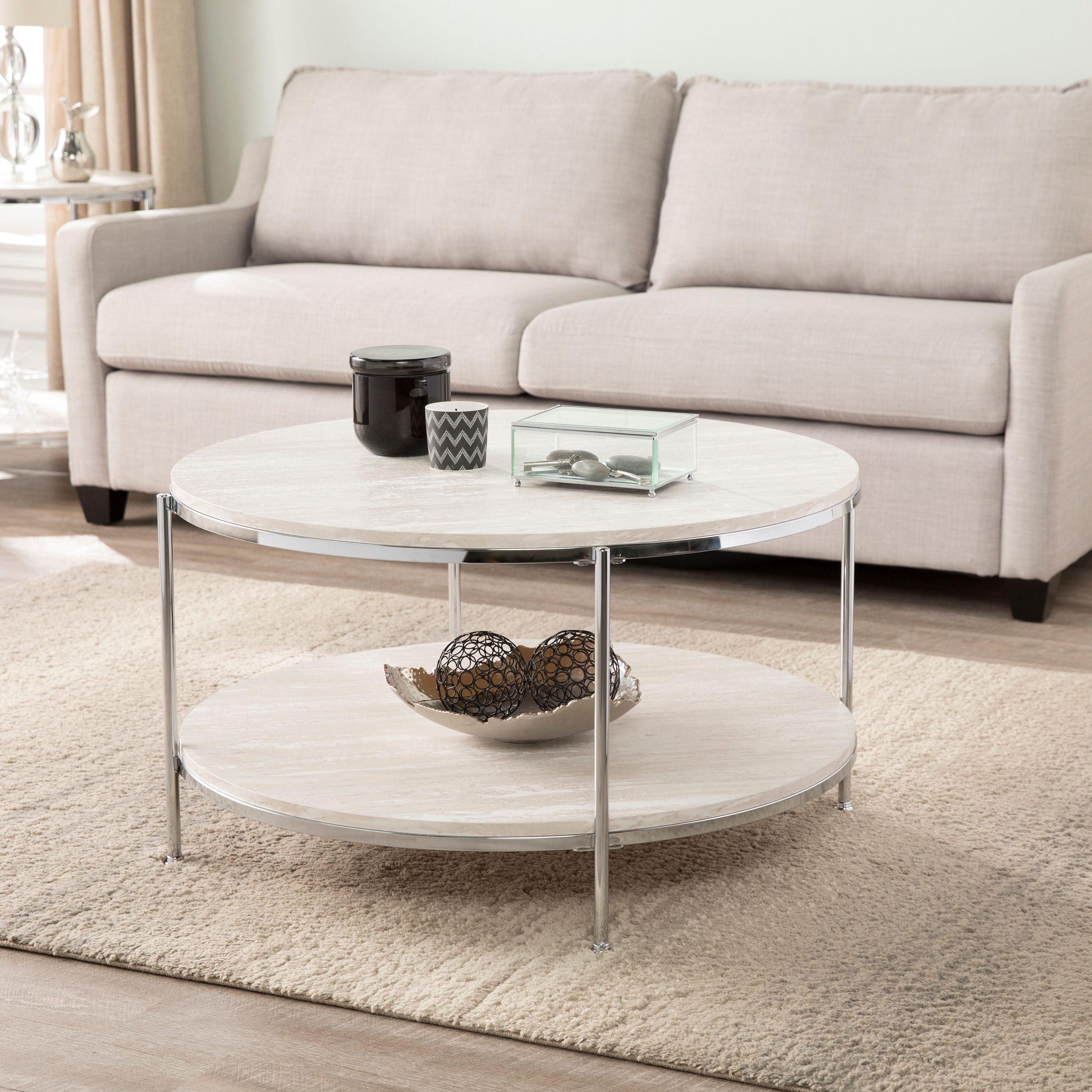 Round Faux Travertine and Chrome Cocktail Table with Shelf