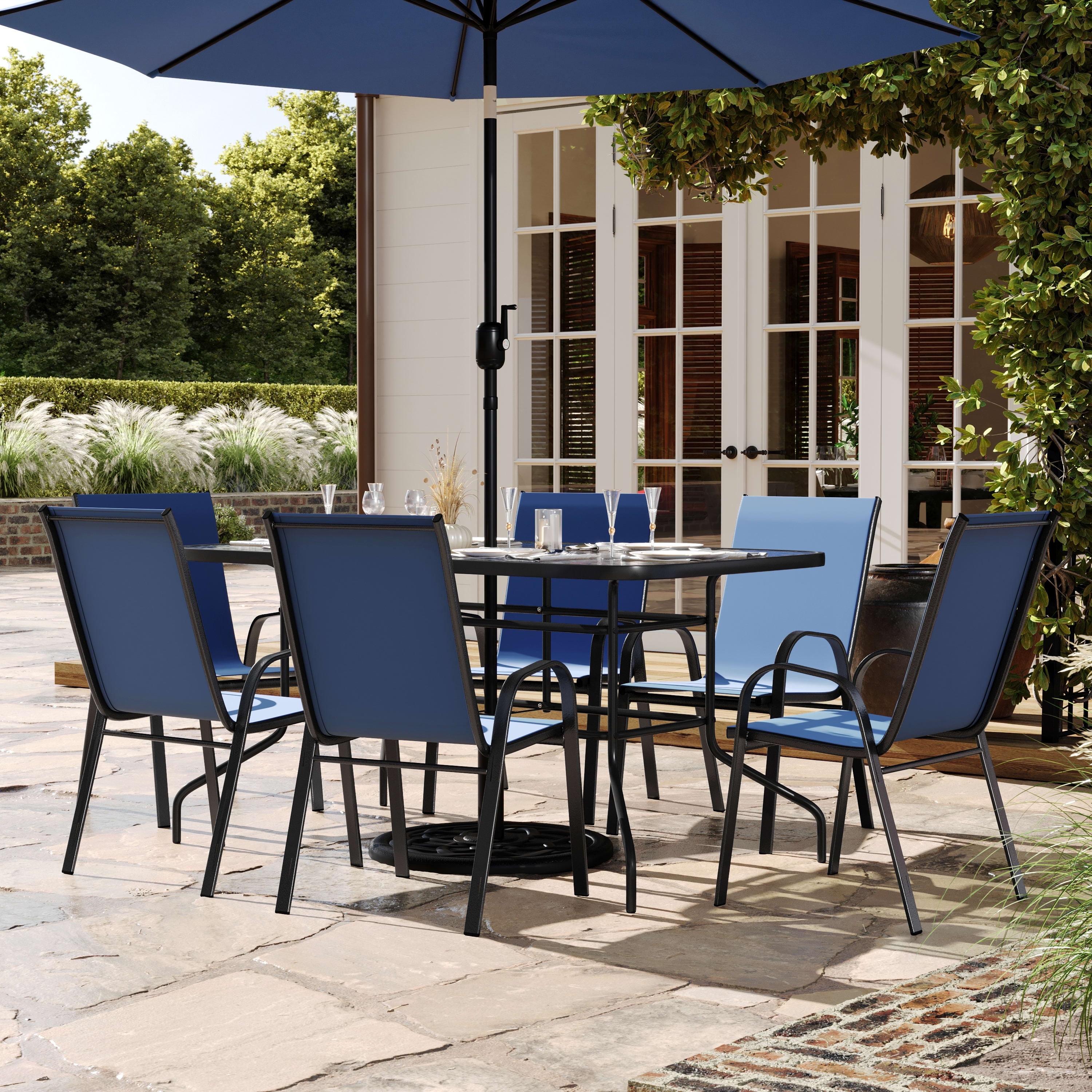 Flash Furniture Brazos 7 Piece Outdoor Patio Dining Set - 55" Tempered Glass Patio Table with Umbrella Hole, 6 Navy Flex Comfort Stack Chairs