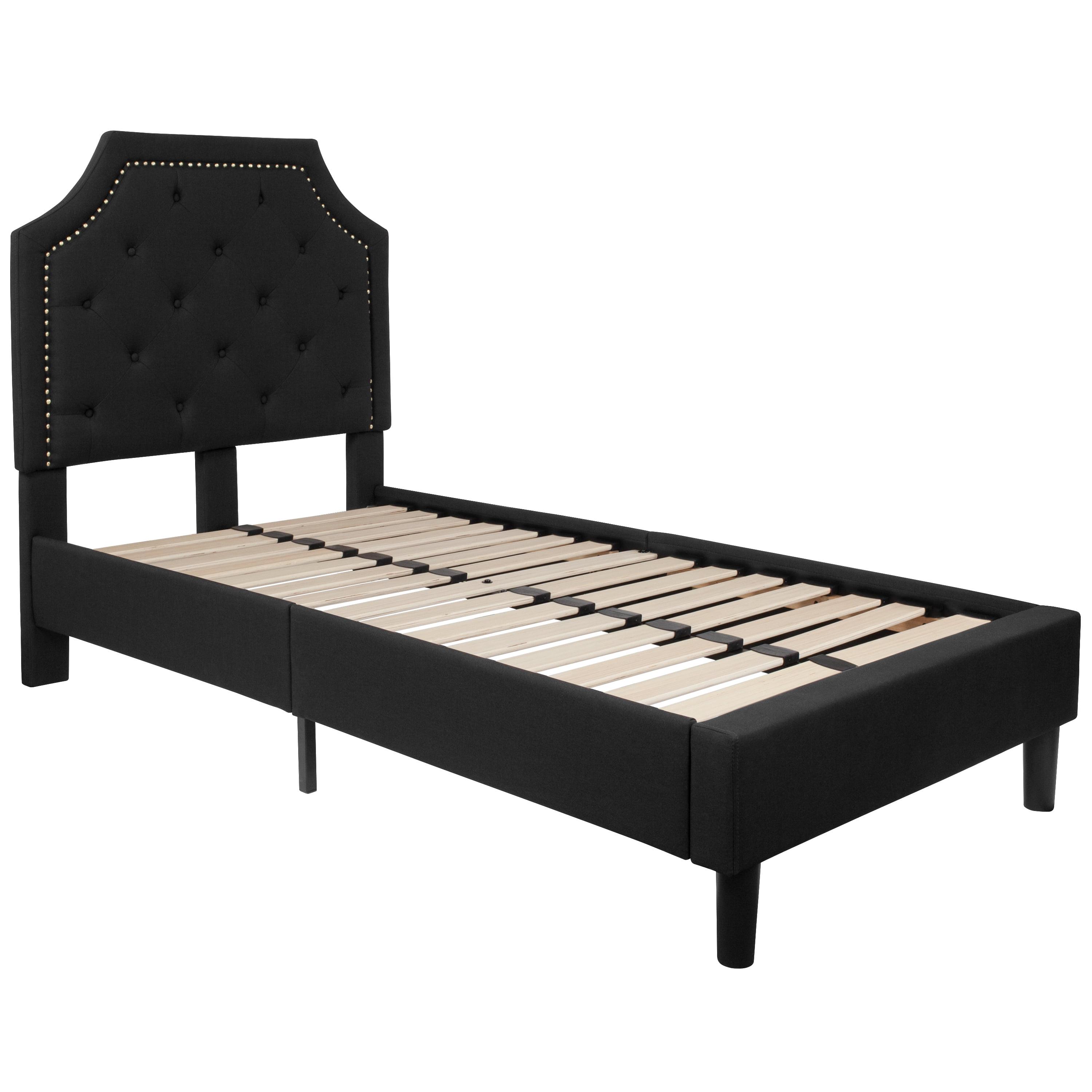 Elegant Twin-Sized Black Upholstered Bed with Tufted Headboard and Gold Nailhead Trim